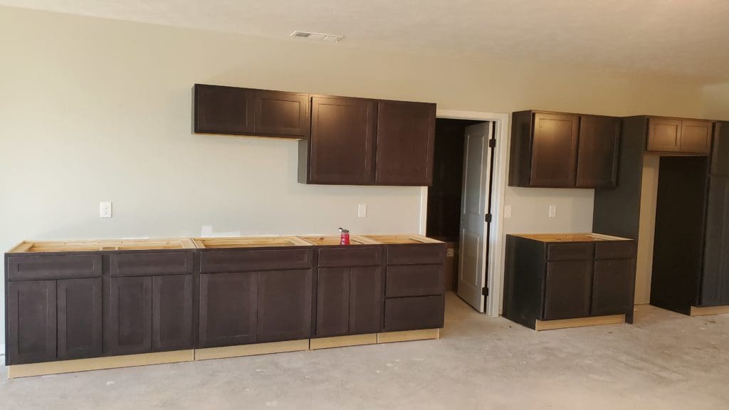 Brown cabinets part of custom cabinetry project completed by CNT Builders in Spearfish, SD.